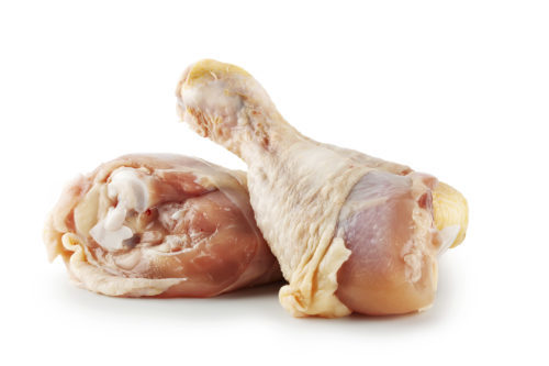 Two raw chicken legs